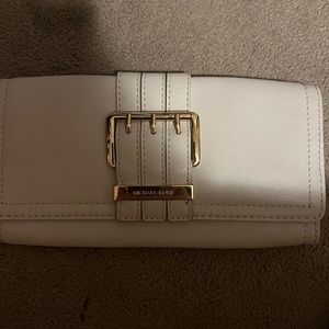MICHAEL KORS
Leather Buckle Clutch